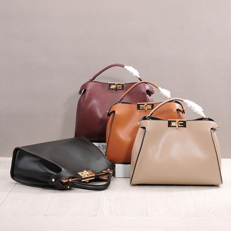 Metal Lock Shoulder Bags | New leather swivel button crossbody carrying cowhide messenger bag